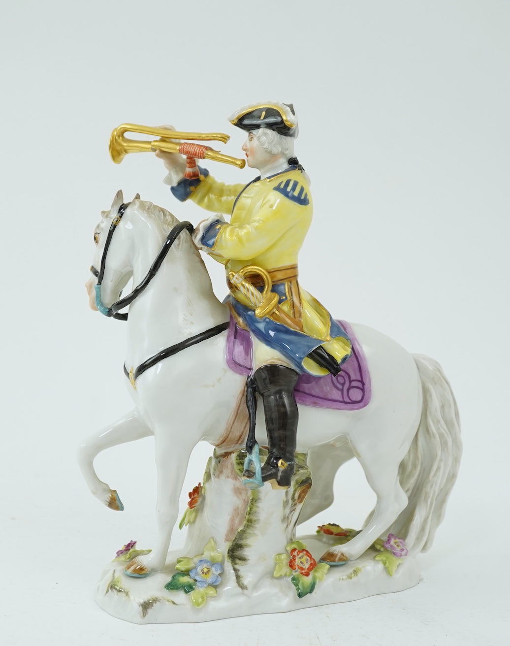 A Meissen group of a bugler on horseback, early 20th century